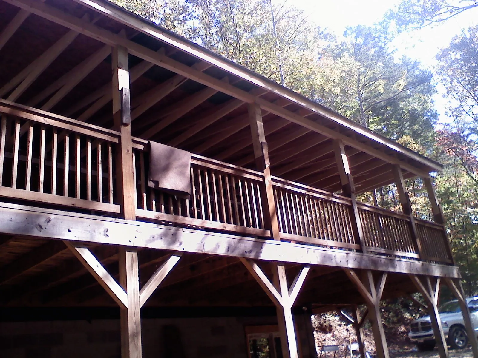 Timber framing under a new elevated porch and deck — Roof Leak Repair in De Mossville by Roofing Brothers